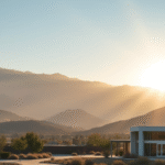 Serene California landscape with mountains and healing light rays, peaceful rehabilitation center exterior, soft natural lighting, no text no words no letters