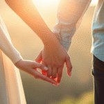 Couple holding hands in soft natural lighting with calming blue and green tones representing hope and healing no text no words no letters