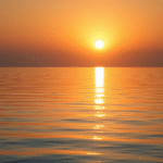 Peaceful sunrise over calm water with soft golden light creating sense of clarity and new beginnings no text no words no letters