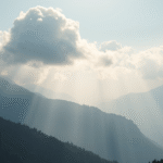 Peaceful mountain landscape with soft morning light filtering through clouds, serene atmosphere, calming blues and greens, no text no words no letters