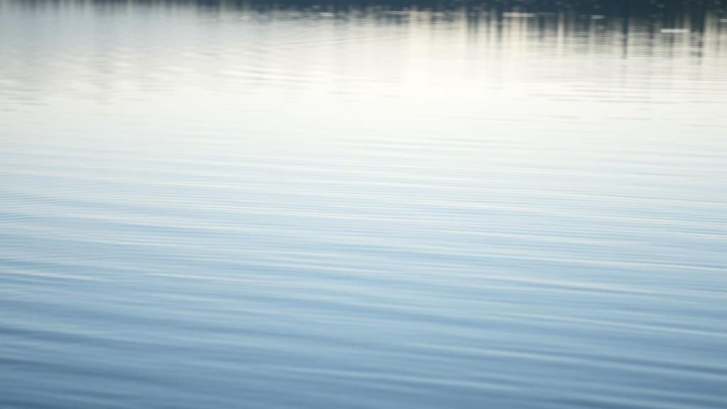 Calm lake reflection with gentle ripples and soft natural lighting, symbolizing inner peace and self-reflection, no text no words no letters