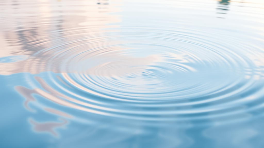 Abstract mirror reflection with gentle flowing water and soft pastel colors representing inner journey, no text no words no letters