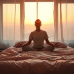 A serene bedroom with soft warm lighting, person meditating peacefully on bed at sunset, calm expression, natural materials, photorealistic, no text