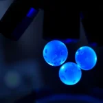 Close-up of glowing blue platelets under microscope, medical visualization, scientific accuracy, laboratory setting, magnified cellular structure with luminescent effect, no text or labels