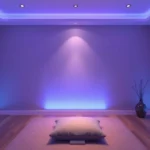 Serene meditation room with soft blue and purple lighting, comfortable cushioned chair, peaceful atmosphere for therapeutic sessions, no people visible